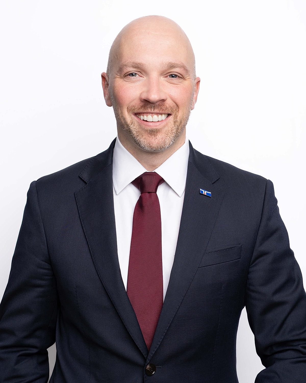 Smiling man in a suit with a tie