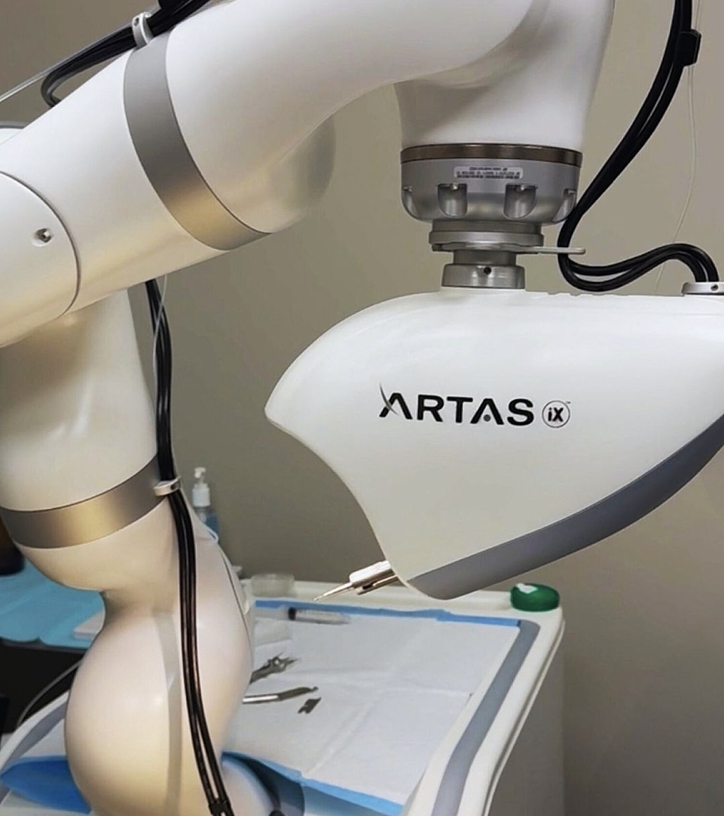 Robot-assisted surgical tool in a medical setting.