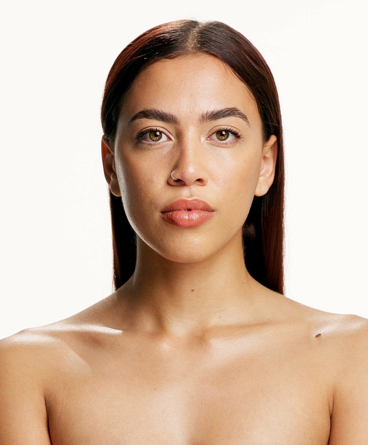 Portrait of a woman with long, straight hair.