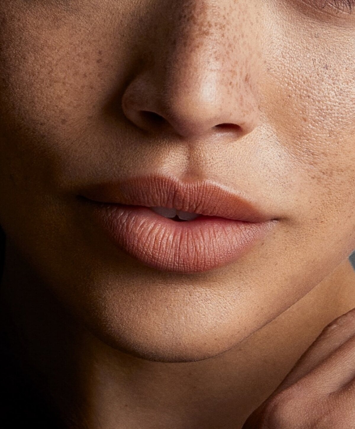 Close-up of lips and skin texture.