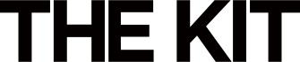 Stylized text reading "THE KIT" in black.