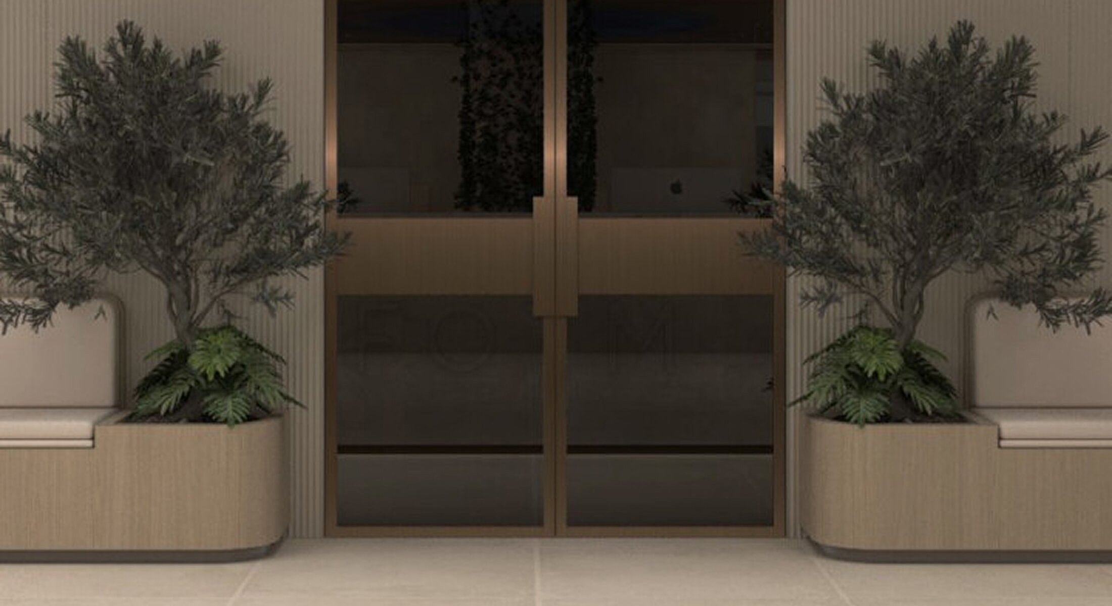 Modern entrance with plants and warm tones.