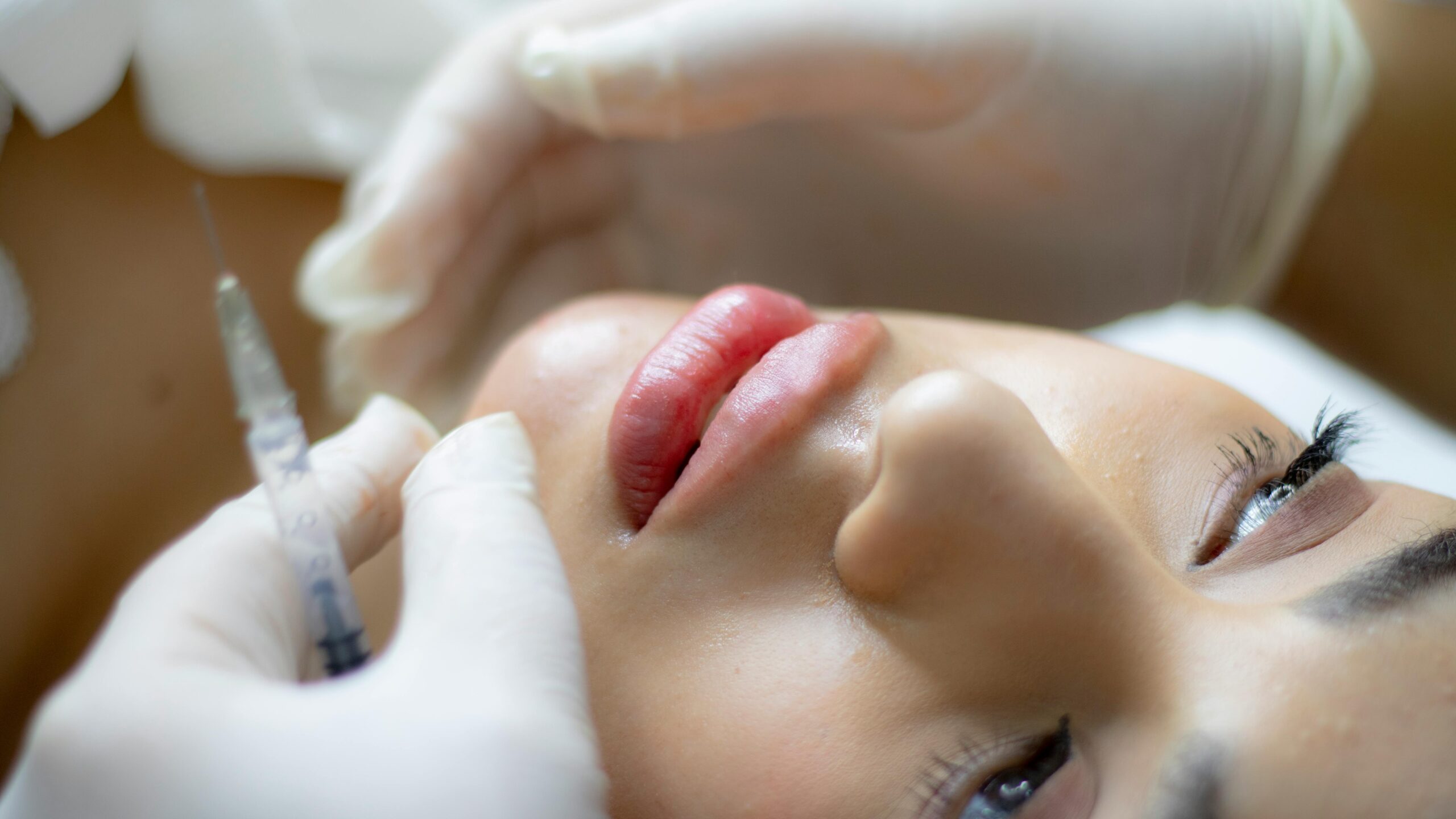 close up of a person's face, specifically the lips